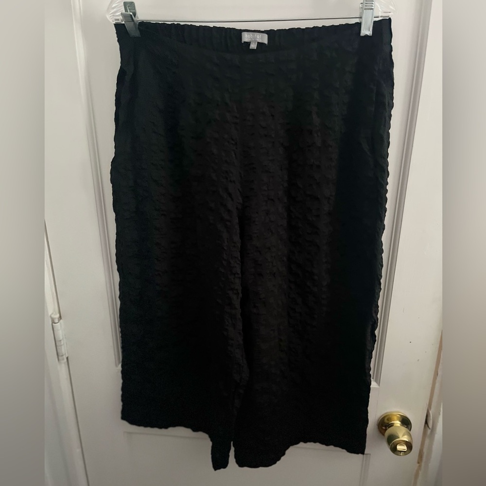 - Habitat black Capri